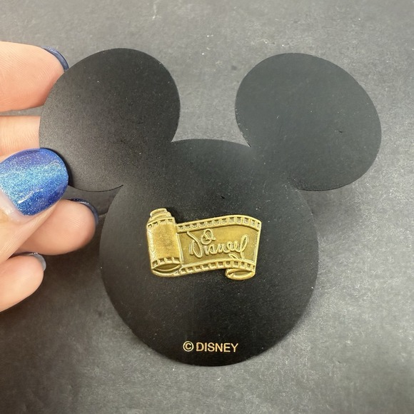 Disney Pin Filmstrip Bronze Scroll Signature Logo Collection Pin Disneyland - Picture 1 of 5